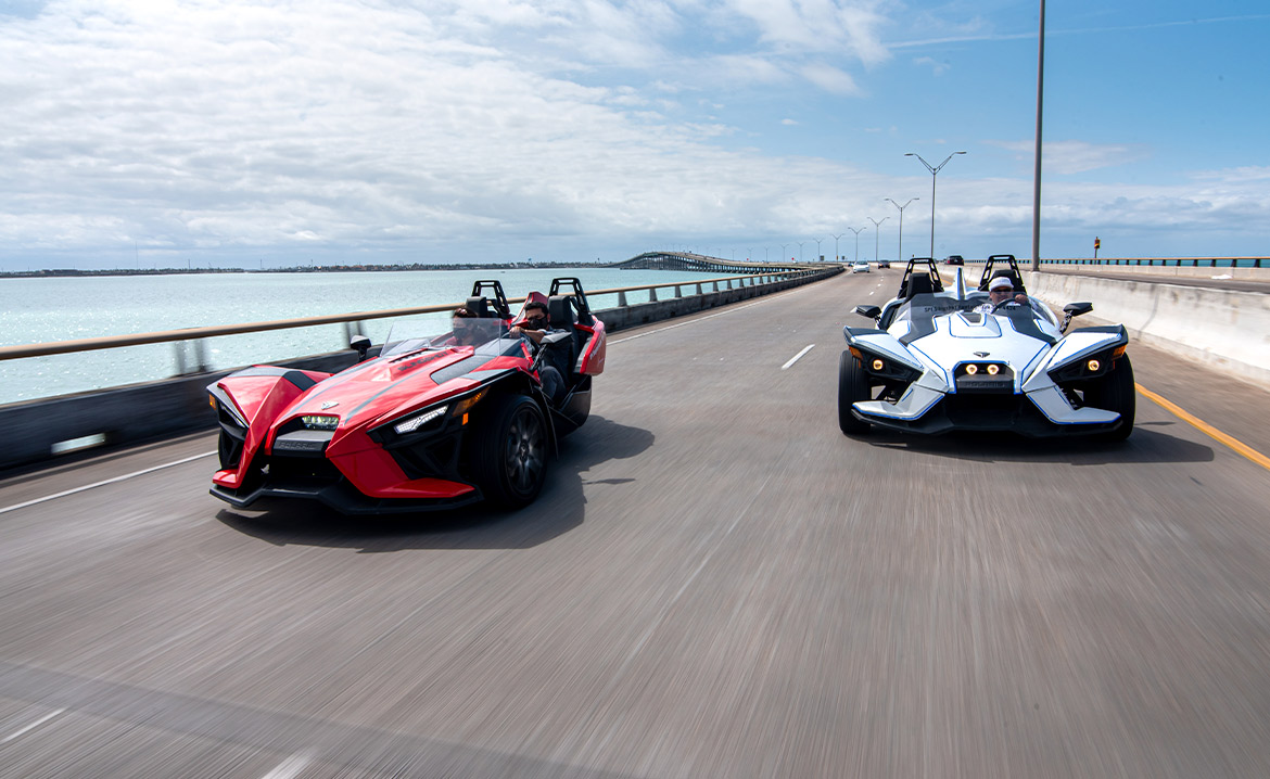 Two slingshots on the road